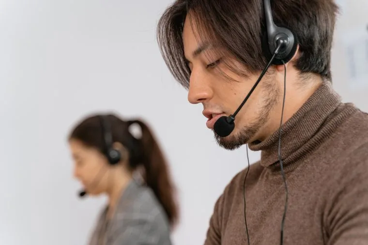 A receptionist answering an incoming call