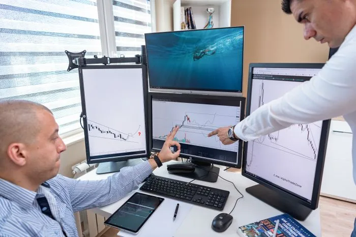 An analyst reviewing data on screen