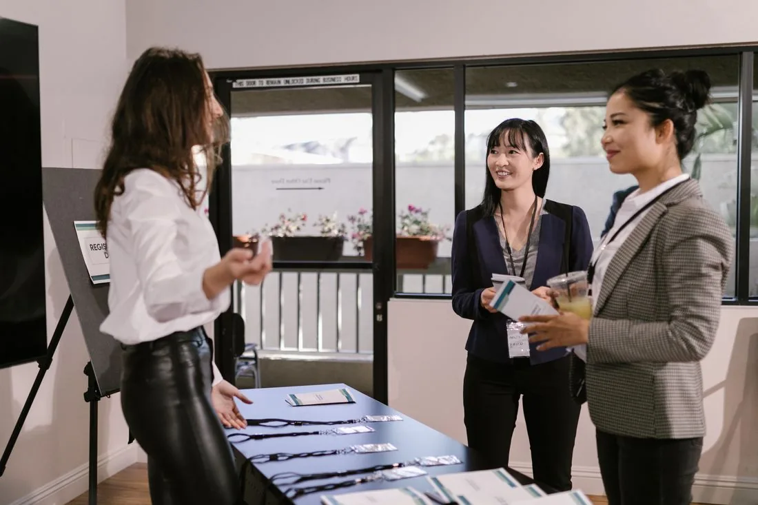 People talking at a business networking event