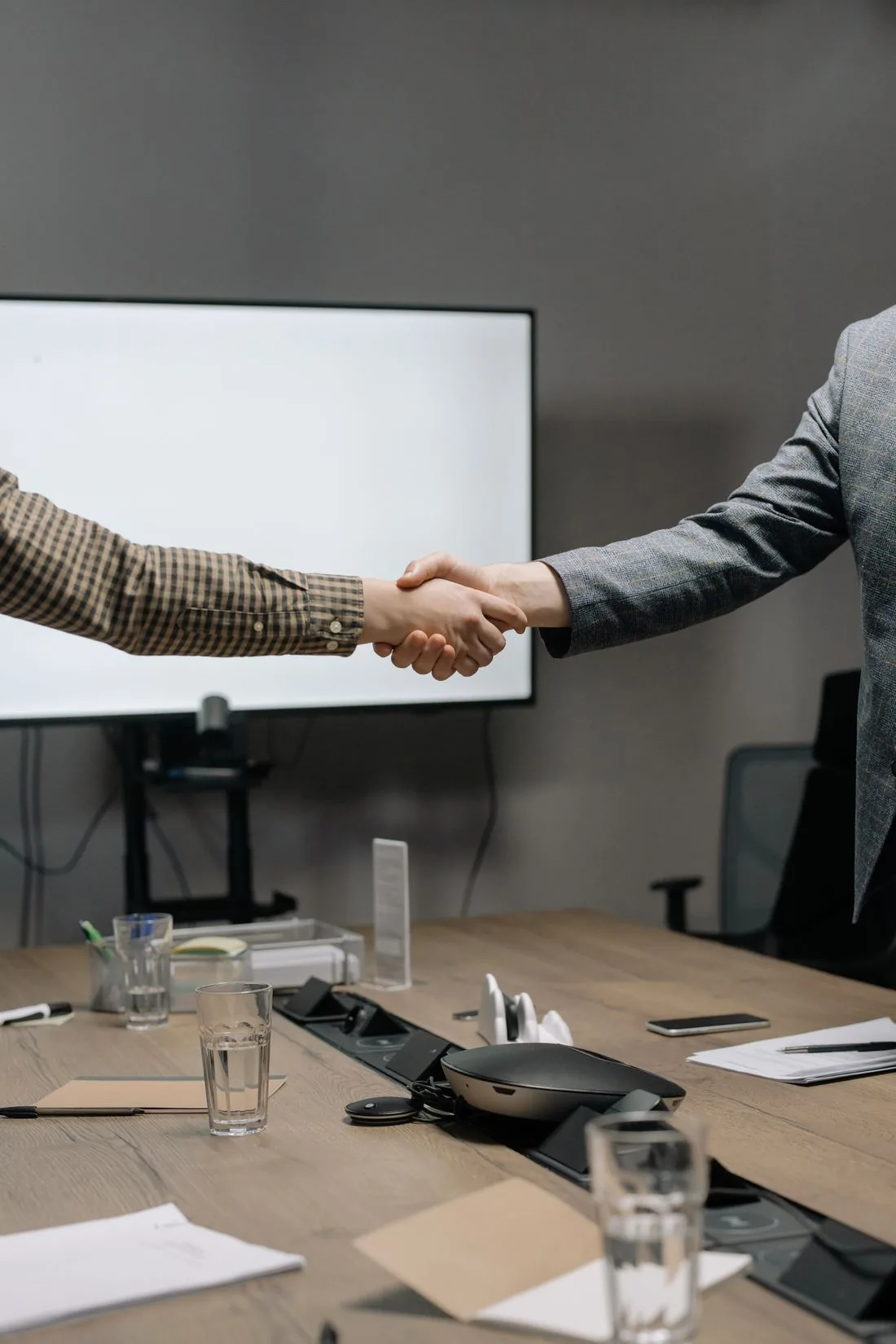 A small team working together in a meeting room